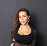 Model wearing Double Take Necklace & earrings