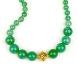 closer look at the hollow scroll bead and green jade