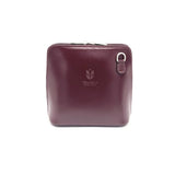 Maroon leather wallet with a visible brand logo on a white background