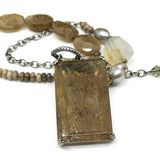 Andalusite gemstone pendant–close up