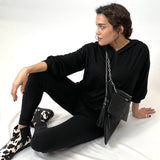 Model showing Black Tassel Belt Bag and Black  Satchel worn together