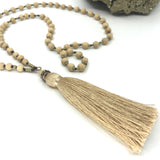 Om 1 Necklace, closeup of silk tassel