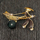 Vintage Mid-Century Rickshaw pin  with black enamel, green lucite wheel and rhinestones