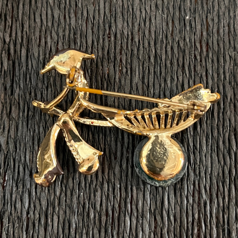 Vintage Mid-Century Rickshaw pin  with black enamel, green lucite wheel and rhinestones_backside