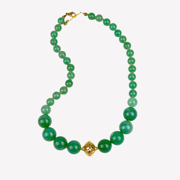 Graded Jade Necklace with Vermeil hollow scroll bead in the center.