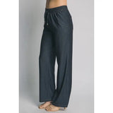 Dark blue pants on a gray background