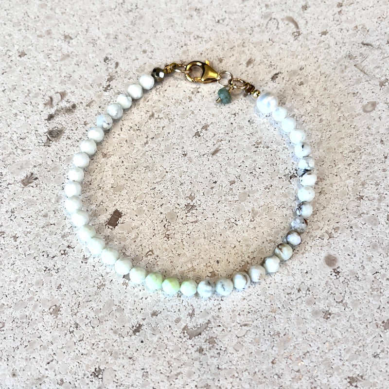 Beaded bracelet on a textured surface
