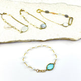 4 Bracelets: I Pearl, I Quartz, Bronze, Aquamarine