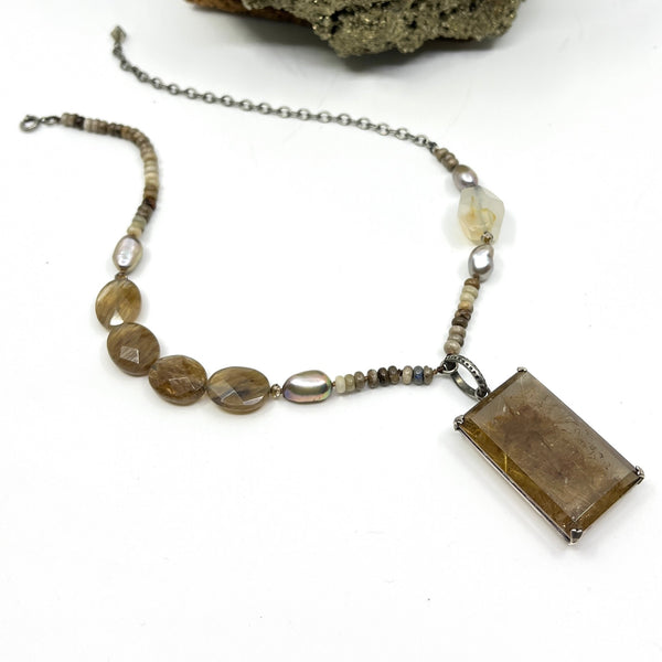 Andalusite gemstone necklace with champagne pearls