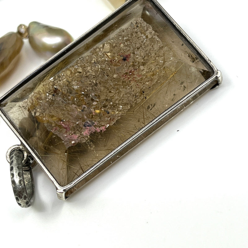 Andalusite gemstone pendant–close up_raw back side