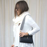 Crossbody Clutch with wide canvas strap on Model