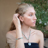 Model wearing Dynasty Jade Necklace, Bracelet and earrings