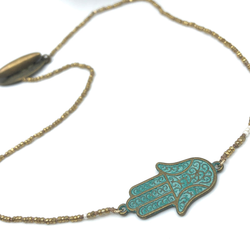 Hamsa Patina with Gold Charlotte Beads_necklace close up