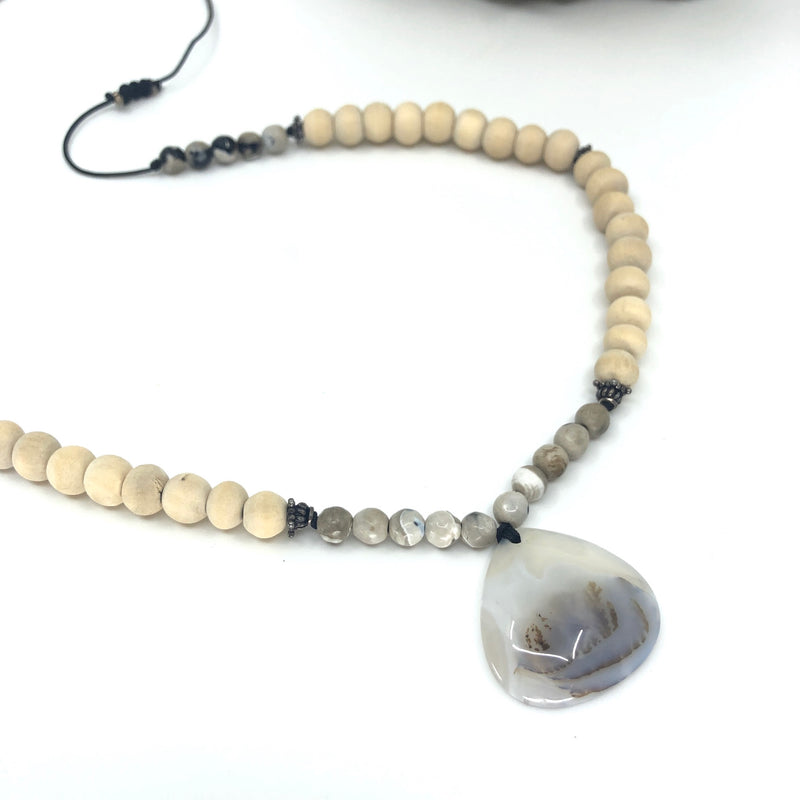 Om 4 Necklace, wood & ocean agate, closeup pendant